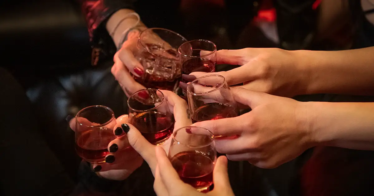 a group of woman celebrating with von payne whiskey in Oregon